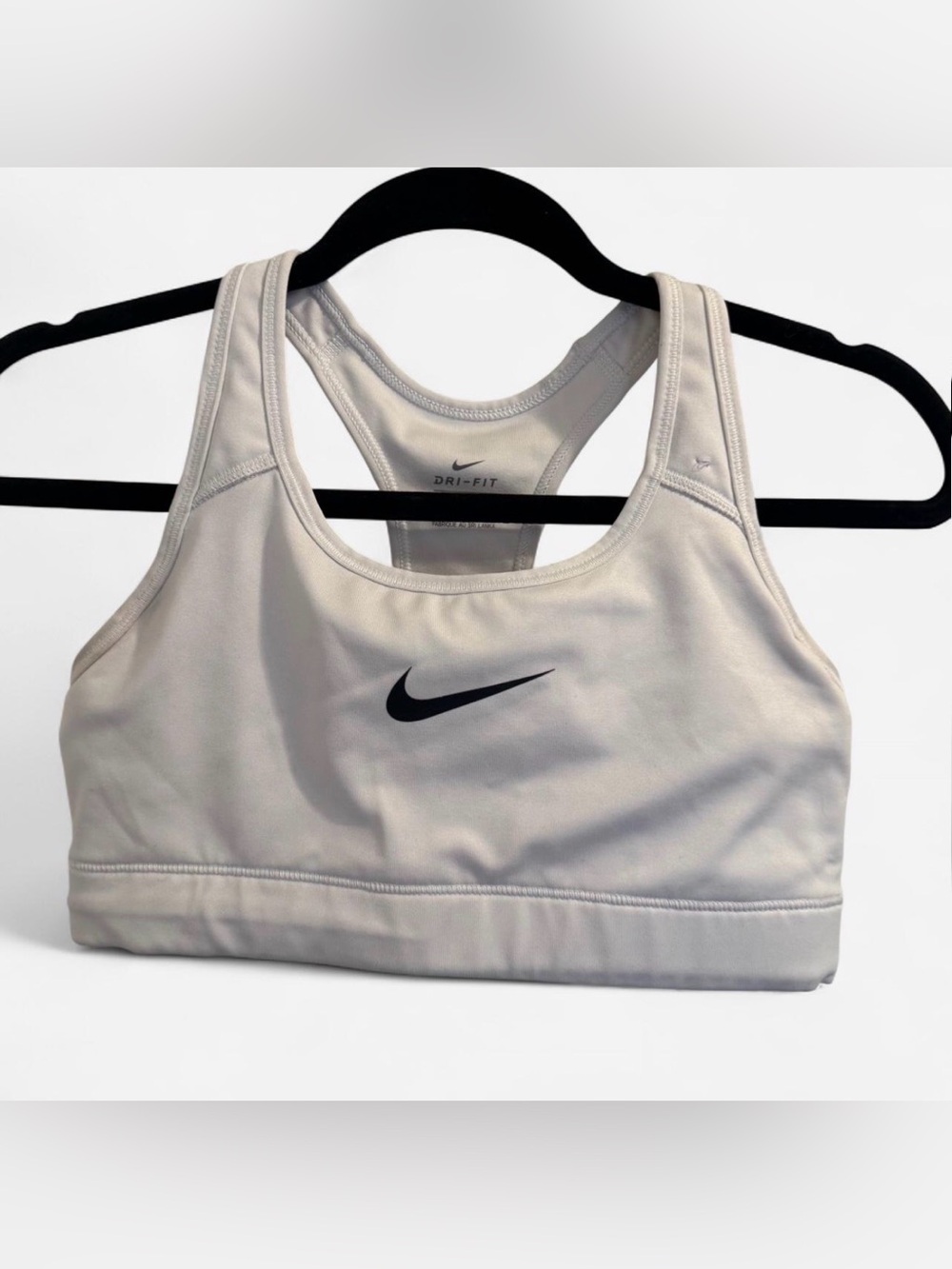 White Nike Dri-FIT Racerback Sports Bra with Black Swoosh
